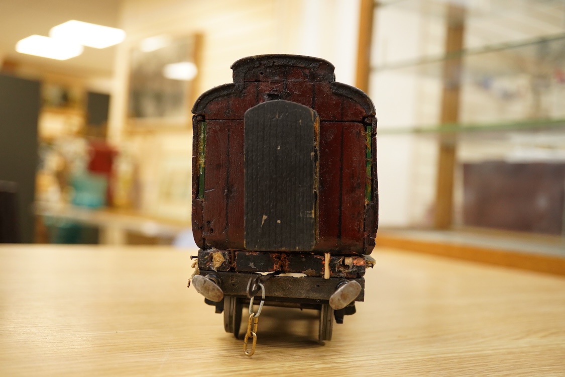 Two Gauge One bogie coaches; a Midland Railway clerestory coach, together with a 12-wheel Pullman car (bogies af), plus an American outline caboose, some scratch building and adaptation from kits, etc.